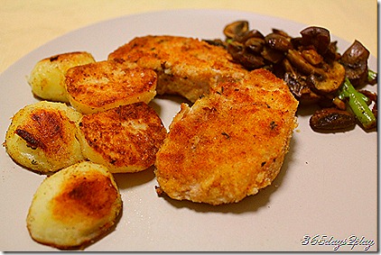 Crumbed pork with spuds and mushrooms