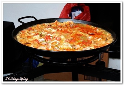 Open air cooking of paella Open air cooking of paella