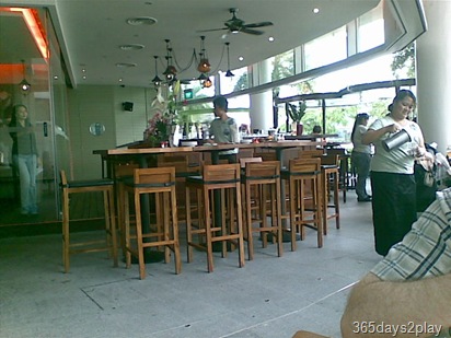 The Queen and the Mangosteen outdoor bar seats